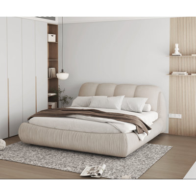 Henness Upholstered Sleigh Bed