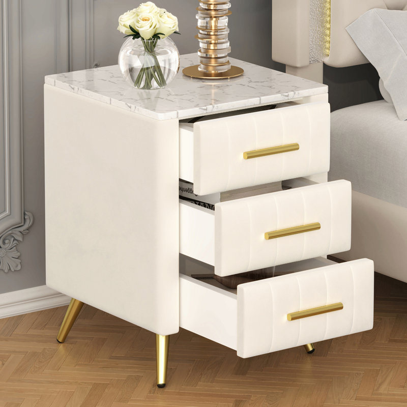 Table de chevet rembourrée en bois avec 3 tiroirs et pieds et poignées en métal, table de chevet avec plan de travail autocollant marbré - beige