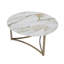 Table basse, plateau en pierre frittée et finition champagne