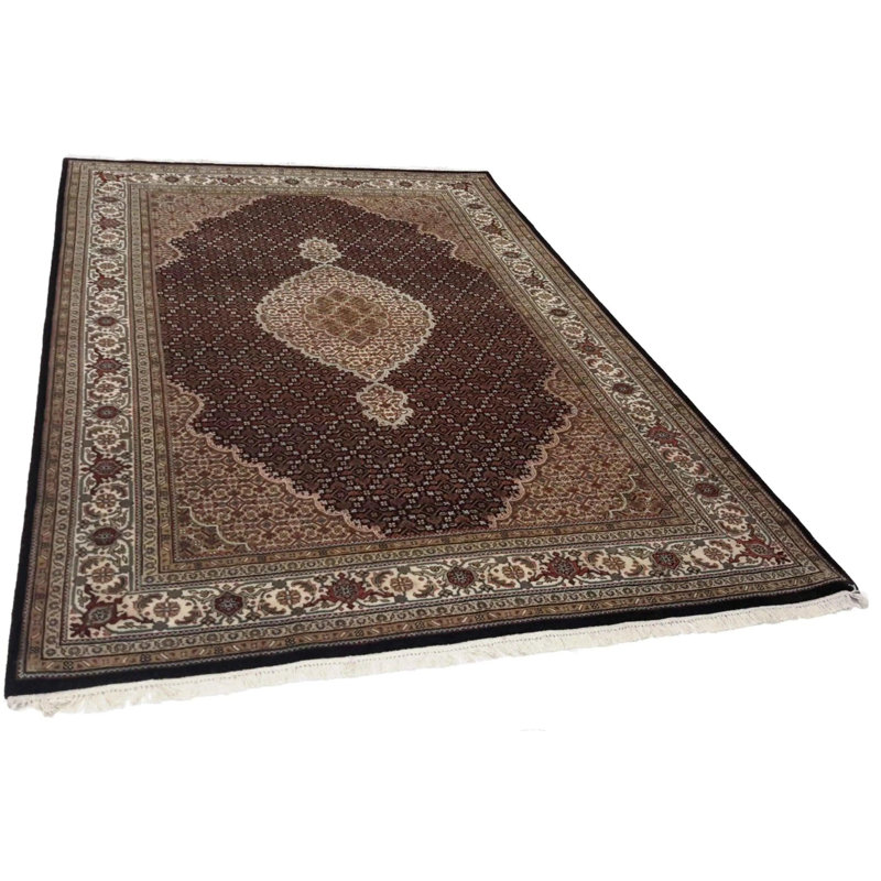 Losh Oriental Area Rug in Black