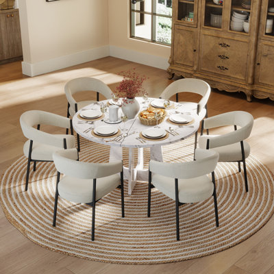 Ensemble de table de salle à manger ronde en bois avec fauteuil, table de cuisine minimaliste de 47 po avec base à double piédestal et chaises pour petits espaces