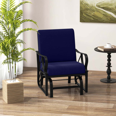 Chaise berçante de patio avec coussin