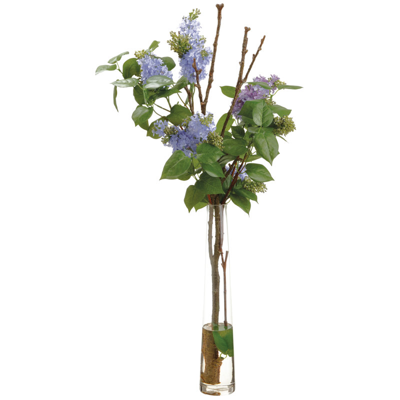 Arrangement floral lilas dans un vase