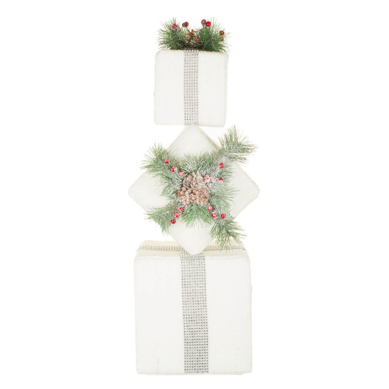 Pile de cadeaux tricotés en strass blanc