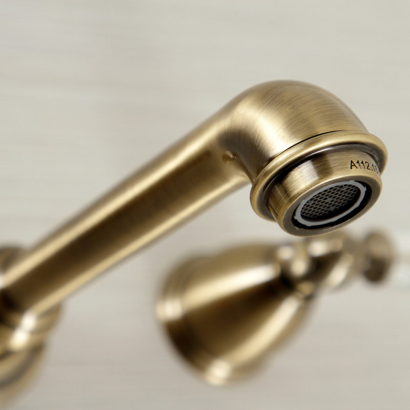 Kingston Brass Wilshire Two-Handle 3-Hole Wall Mount Bathroom Faucet, Antique Brass