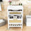 Meuble-lavabo autoportant moderne avec lavabo en céramique, tiroir escamotable, rangement ouvert et façade en rotin-1523884800