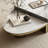 51" Oval Coffee Table: Modern Luxury Sintered Stone Top & Metal Base, Two-Tone Durable Design