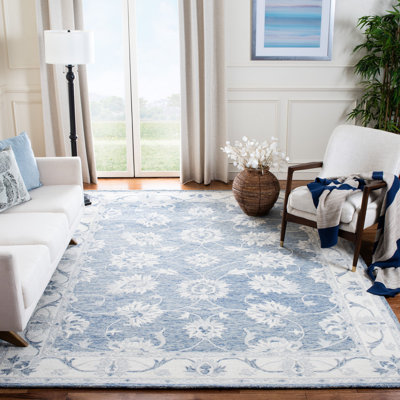 Vallelunga Oriental Handmade Tufted Wool Blue/Ivory Area Rug