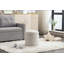 Repose-pieds rond en velours doux