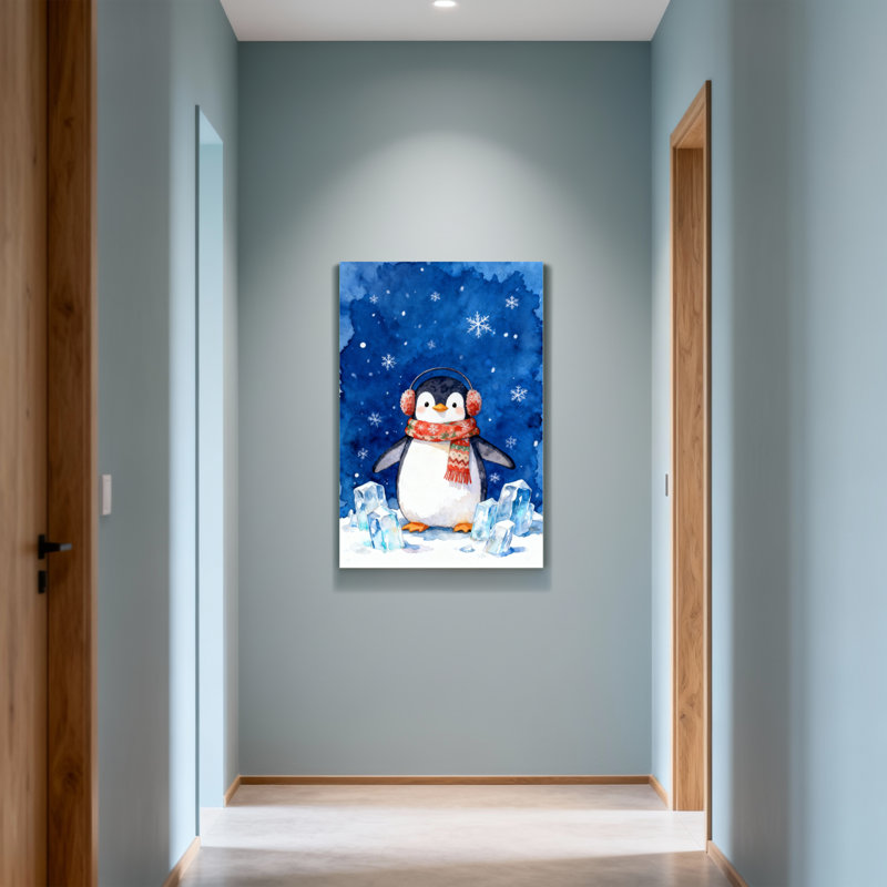 Pingouin de Noël portant un foulard et des cache-oreilles dans la neige, H 24 po x l 16 po