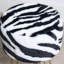 Tabouret rond en fausse fourrure-994840339