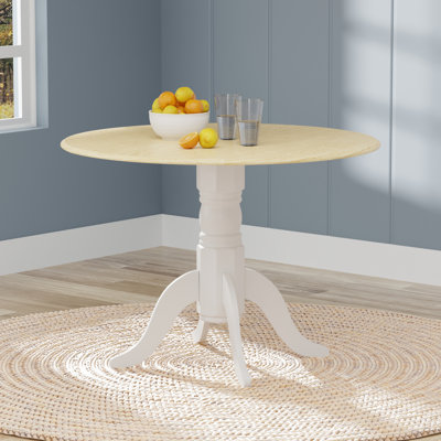 Truman Extendable Round Solid Wood Dining Table