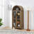 A High Arched Storage Cabinet With A Lamp-336783767