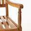 Chaise berçante rustique avec un design traditionnel et un style de mouvement relaxant pour les moments de loisirs en plein air