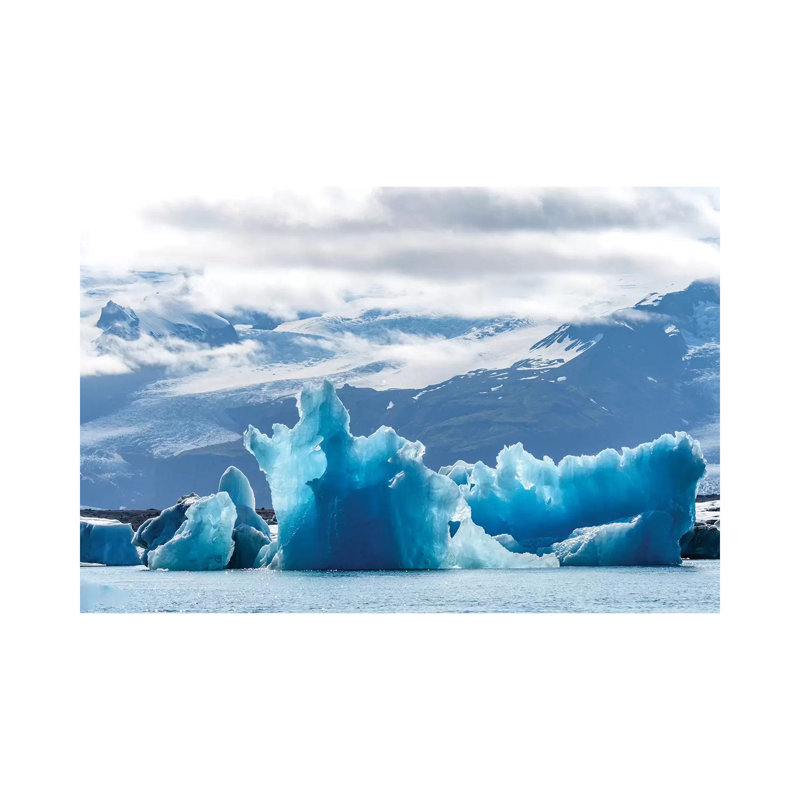 Iceland, Floating Glaciers Form Blue Ice Sculptures In Jokulsarlon, Glacier Lagoon. by Mark Williford - Wrapped Canvas Print