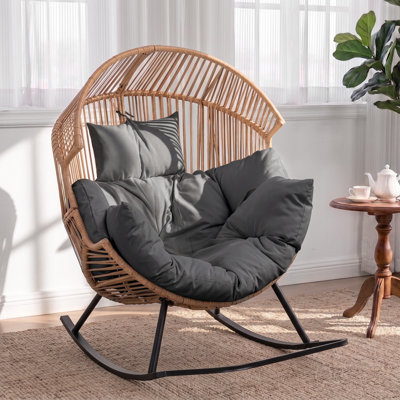 Fauteuil à bascule berçant avec coussin