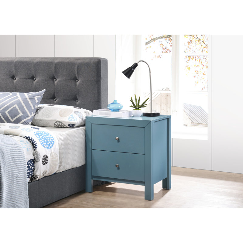Charmante table de chevet bleu sarcelle avec deux tiroirs pour un salon d'une grande impression