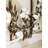 Metal Faux Wreath On Window Frame