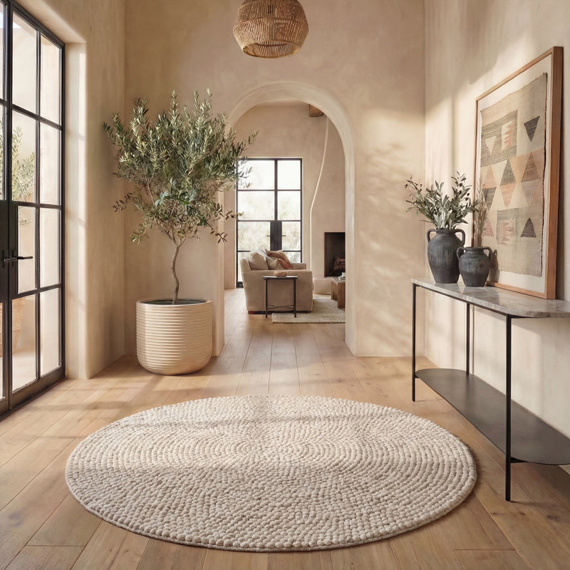 Tapis touffeté à la main de couleur unie Almus beige / ivoire, Rond 6 pi