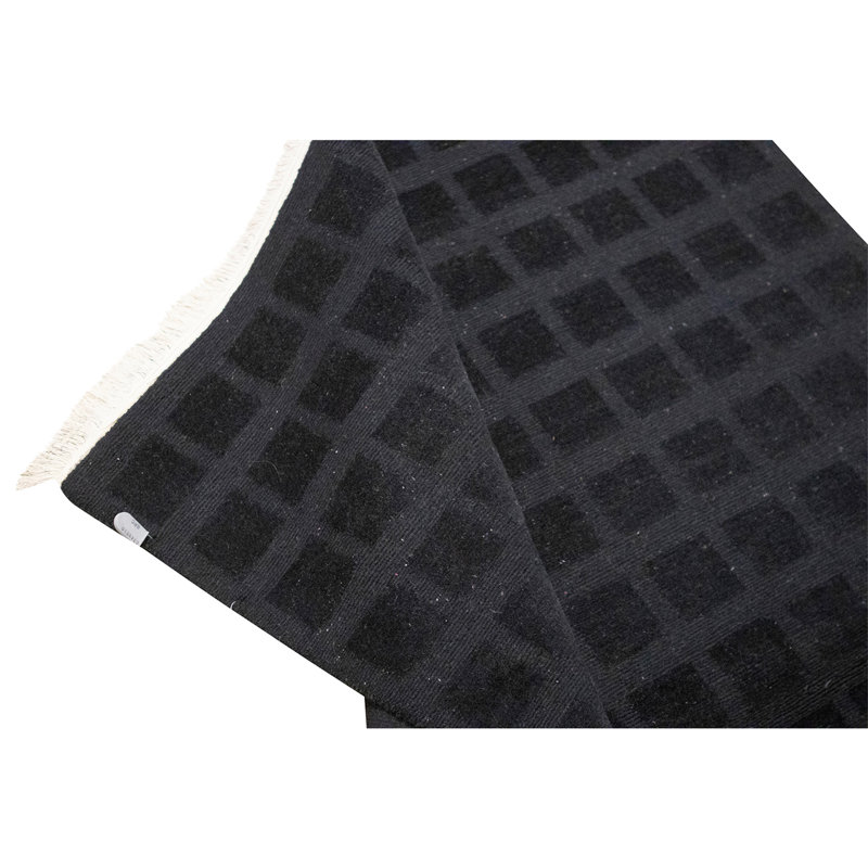 Tapis noir noué à la main de haute qualité