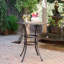 Table de bar en fonte d'aluminium avec motif en treillis et porte-parapluie pour un repas en plein air élégant