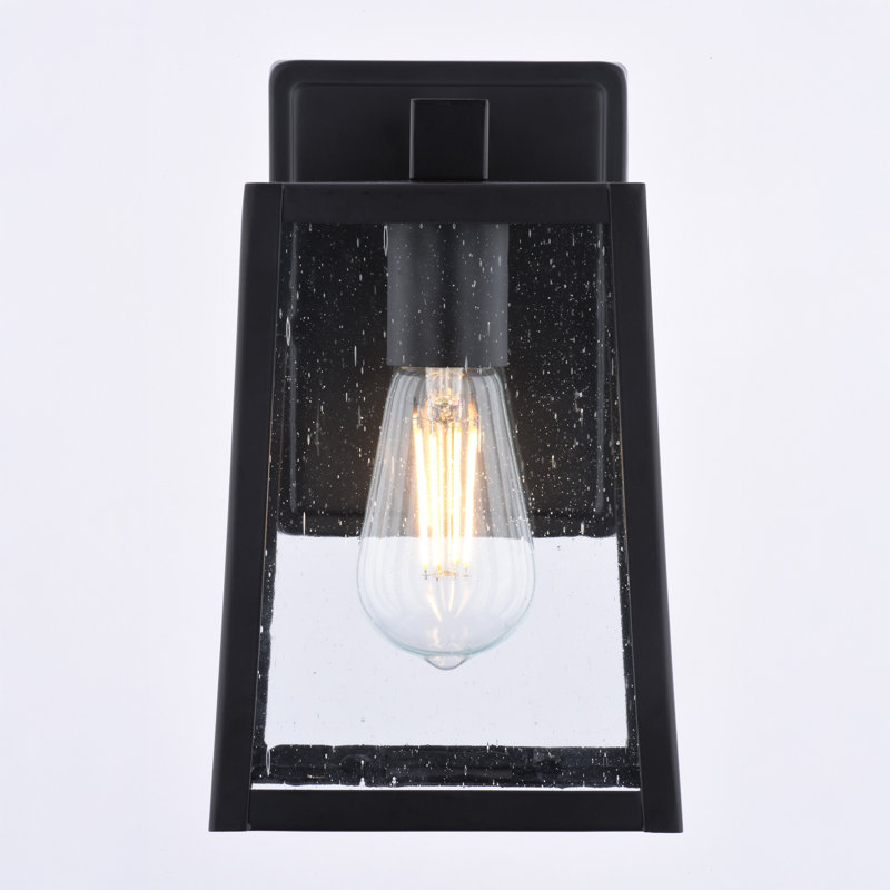  Sutton 9.5 in. H 1-Light Matte Black Contemporary Outdoor Wall Sconce made of Durable Steel, Clear Seeded Glass, LED Compatible, Use for Exterior Porch Patio Front Door or Garage