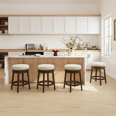 Tabouret de bar rembourré pivotant avec structure en bois massif et garniture cloutée
