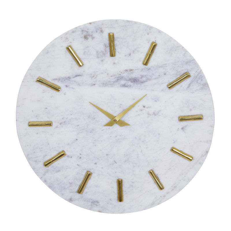 Horloge murale décorative en marbre avec détails en métal doré