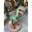 Statue de petit dinosaure petit rapace vert