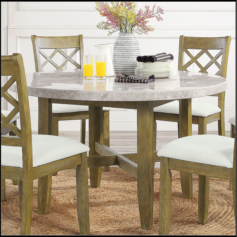 Table de salle à manger ronde en marbre avec base en chêne rustique, parfaite pour des expériences de salle à manger élégantes et durables