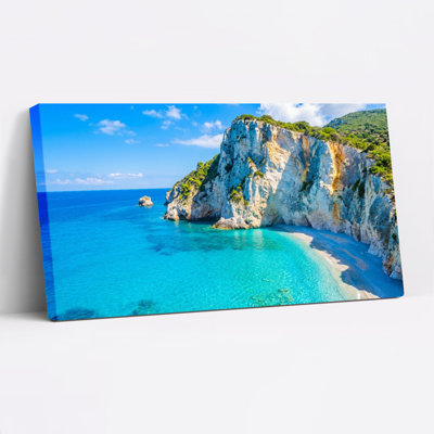 Ensemble de 1 tableau sur toile tendue représentant un paysage tropical de plage et de falaises