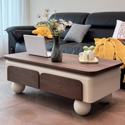 Table basse en placage de noyer avec poignées cachées