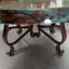 Luxurious Wrought Iron Coffee Table embellished with a 48” Round Oxidized Copper Top