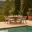Keosauqua 4 - Person Wood Patio Dining Set with Round Table