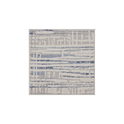 Tapis beige lavable à la machine