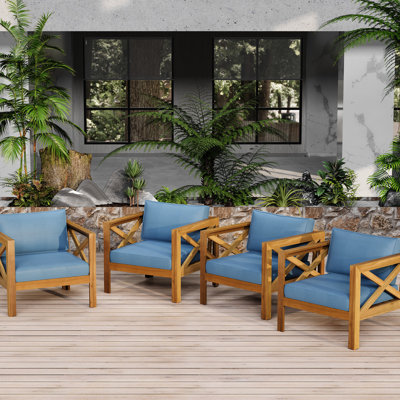 Fauteuil club d'extérieur en bois avec coussins bleus, conversation, assise ergonomique confortable et tissu imperméable résistant aux intempéries