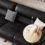Causeuse-coussin modulable noire en cuir véritable
