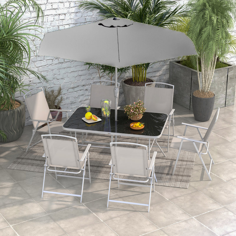 Jovannie 6 - Person Patio Dining Set with Rectangular Table , Cushions Included, Gray/Silver