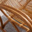 Chaise berçante en rotin brillant