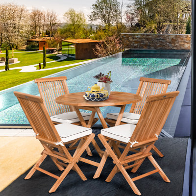 Bartolemo 4 - Person Teak Wood Patio Dining Set with Round Table , Cushions Included