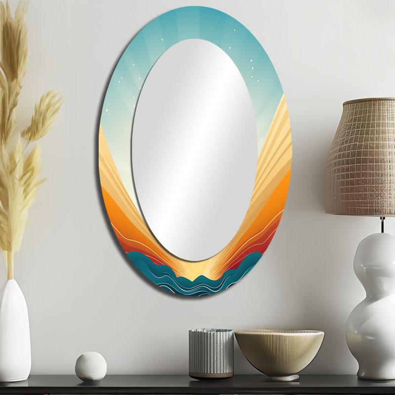 Miroir décoratif ovale abstrait sur support métallique, avec un motif graphique audacieux représentant un coucher de soleil dans des tons bleu sarcelle et orange