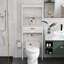 Rangement au-dessus de la salle de bain - Support blanc avec un tiroir et deux tablettes pour les serviettes de toilette