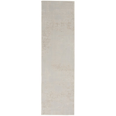 Tapis ivoire tissé à la machine