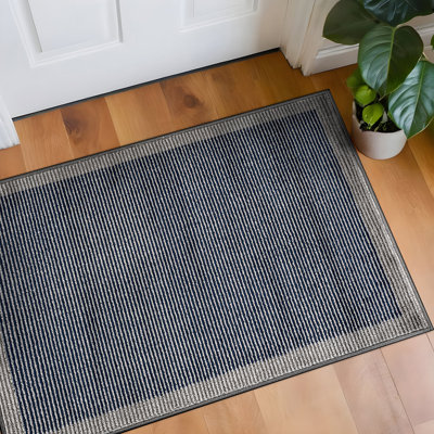Tapis moderne à motif géométrique moderne à bordure