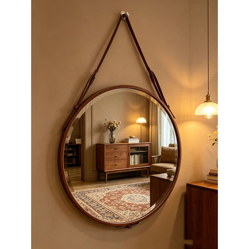 Brown circular hanging mirror