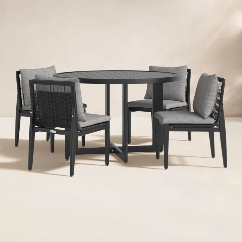 Trosclair Round 4 - Person 48'' Long Dining Set with Cushions