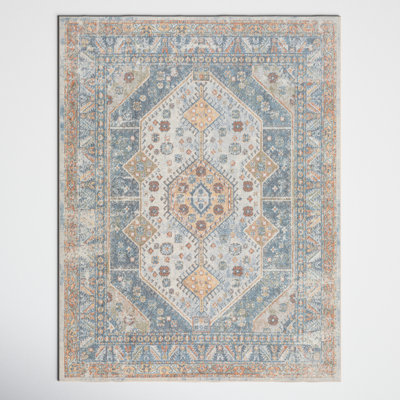 Tapis oriental lavable bleu / ivoire