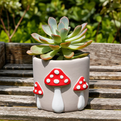 Pot à fleurs en ciment avec accents de champignons - Pot décoratif et durable pour plantes d'intérieur ou d'extérieur.