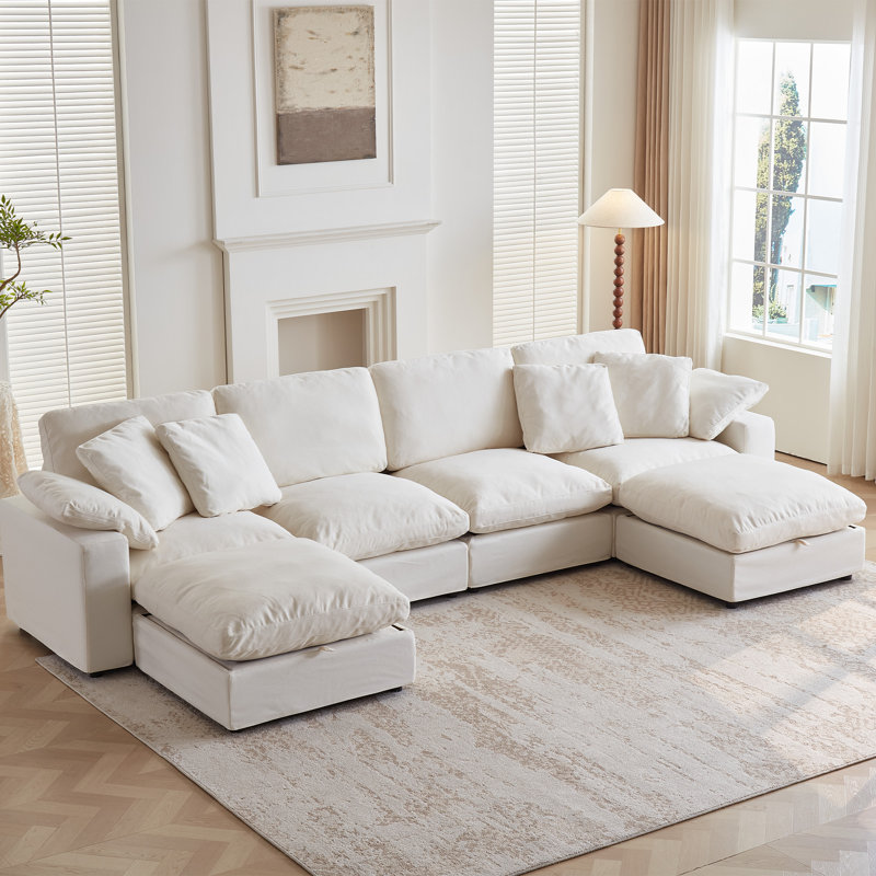 Canapé d'angle modulaire Zenya Cloud Comfort. Sans compression sous vide. Garnissage en duvet et coton. Housses lavables - 4 places avec 2 poufs, blanc cassé.