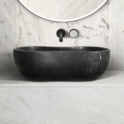 Lavabo en marbre gris foncé ondulé organique de 23,6 pouces, monobloc, fini mat, pour une salle de bain au look gratifiant.